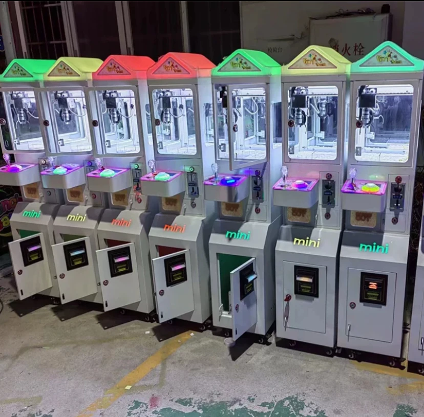 Mini Coin-Operated Mega Small  - مراجعة Arcade Toy Claw Vending Machine وسعره